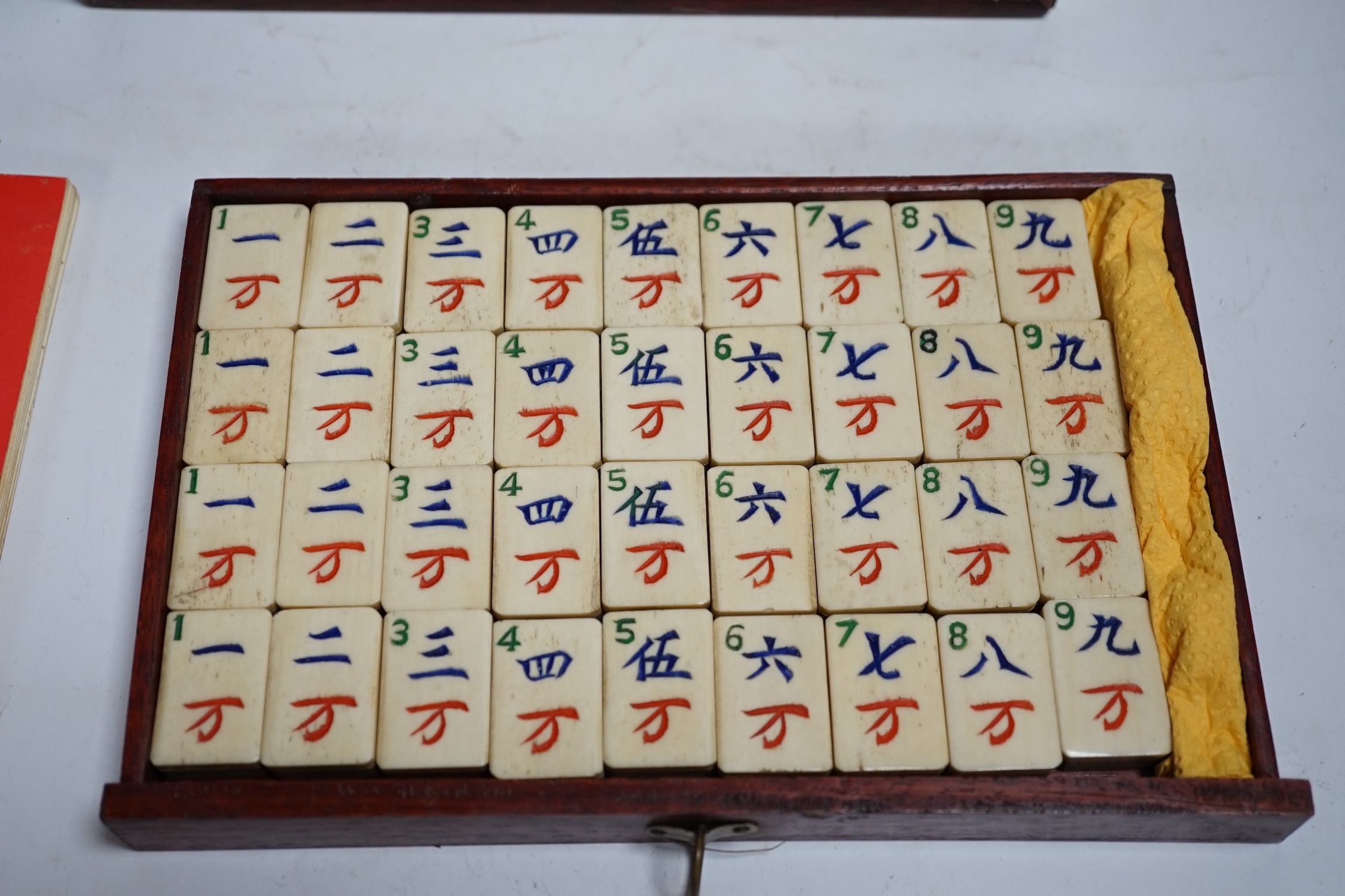 A cased Mah jong set, 24cm wide, 16cm high